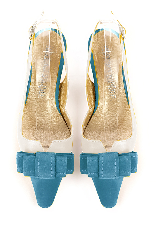 Women's peacock blue and off white elegant slingback heels, with a bow on the front. Tapered toe. Medium spool heels - Top view